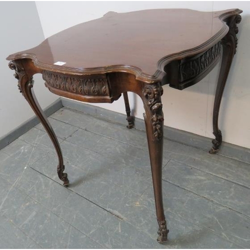 752 - An Edwardian centre table with shaped top and acanthus carved frieze, on cabriole supports with reli... 