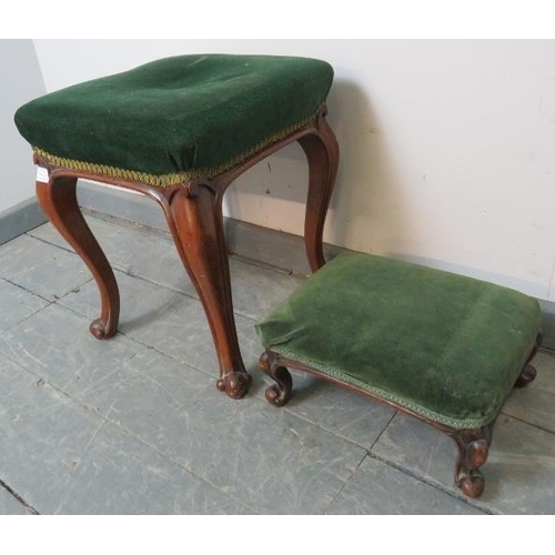 756 - Two Victorian walnut footstools upholstered in green velvet, on cabriole supports with scrolled feet... 