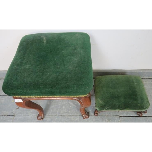 756 - Two Victorian walnut footstools upholstered in green velvet, on cabriole supports with scrolled feet... 