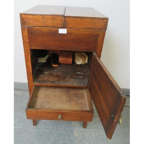 757 - A Georgian oak gentleman’s shaving stand, the hinged double lid opening onto a fitted interior with ... 