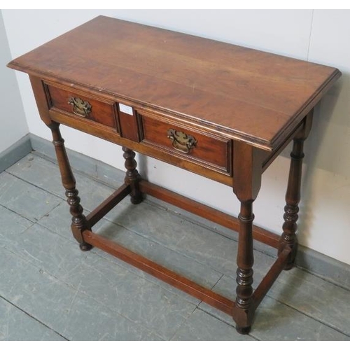 759 - A reproduction cherry wood side table in an 18th century taste, with one long frieze drawer fitted w... 