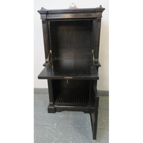 763 - A 19th century Aesthetic Period burr walnut and ebonised music cabinet with ¾ gallery, featuring mar... 