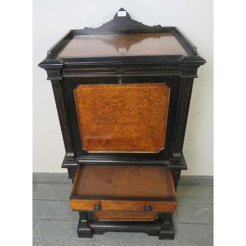 763 - A 19th century Aesthetic Period burr walnut and ebonised music cabinet with ¾ gallery, featuring mar... 