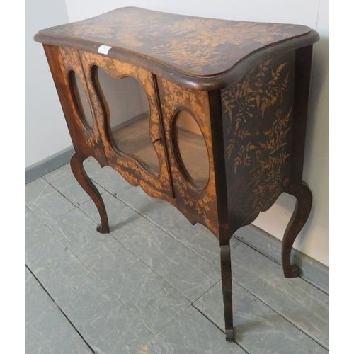 766 - An Arts & Crafts penwork side cabinet, with glazed front, featuring foliate stencil decoration, on c... 