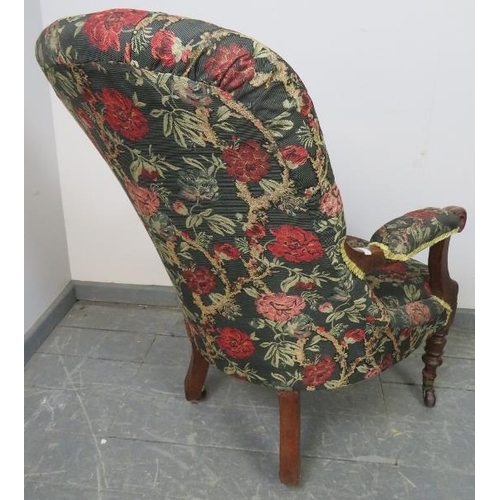 771 - An early Victorian mahogany open-sided armchair, upholstered in patterned tapestry material with gol... 