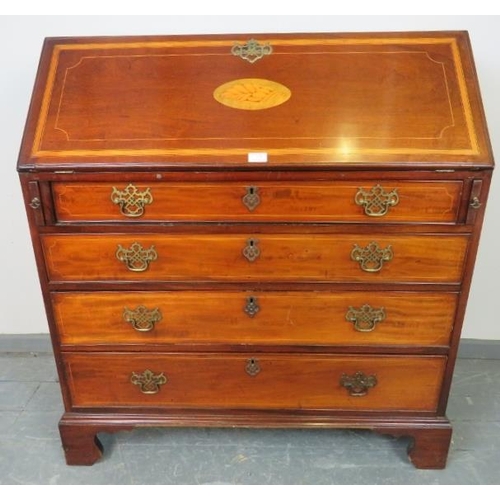 772 - A George III mahogany bureau, with shell inlay and strung with satinwood and ebony, the fall front o... 