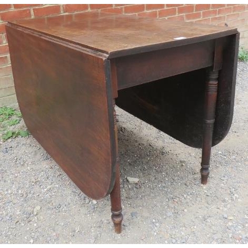 773 - A late Georgian mahogany drop-leaf cottage dining table, on tapering turned supports. 
Condition rep... 