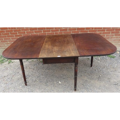 773 - A late Georgian mahogany drop-leaf cottage dining table, on tapering turned supports. 
Condition rep... 