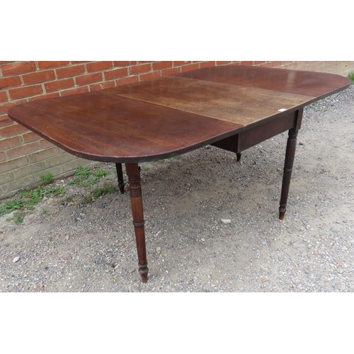 773 - A late Georgian mahogany drop-leaf cottage dining table, on tapering turned supports. 
Condition rep... 