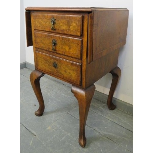 787 - An antique burr walnut side cabinet, crossbanded and strung with boxwood and satinwood, with drop le... 