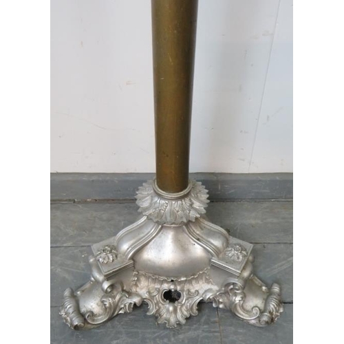 793 - A 19th century telescopic brass standard lamp, on a very ornate cast metal tripod base with scrolled... 