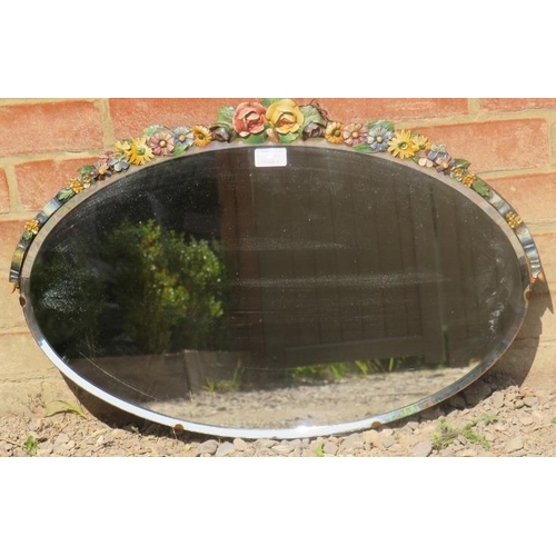 797 - A vintage oval bevelled barbola mirror with moulded floral cornice. 
Condition report: Some cracking... 