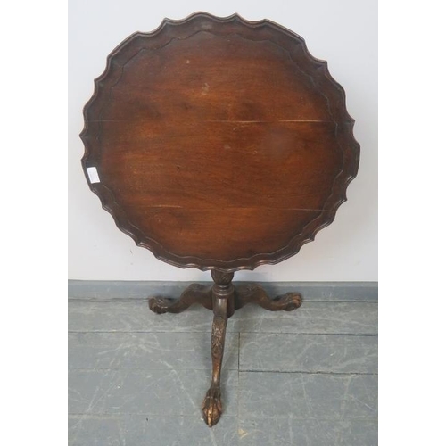 805 - A George III style mahogany tilt-top ‘birdcage’ table with piecrust edge and reeded column, on carve... 