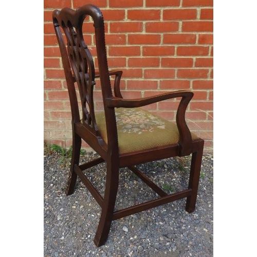 813 - A set of eight (6+2) Georgian mahogany dining chairs with shaped and pierced back splats in the Chip... 