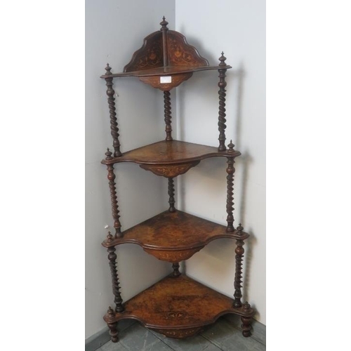 815 - A Victorian burr walnut four-tier corner whatnot, featuring barley twist uprights with finials and m... 