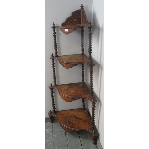 815 - A Victorian burr walnut four-tier corner whatnot, featuring barley twist uprights with finials and m... 