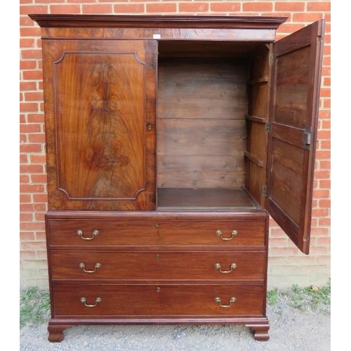 819 - A Georgian flame mahogany linen press, with two cupboard doors over three oak lined graduated cock-b... 