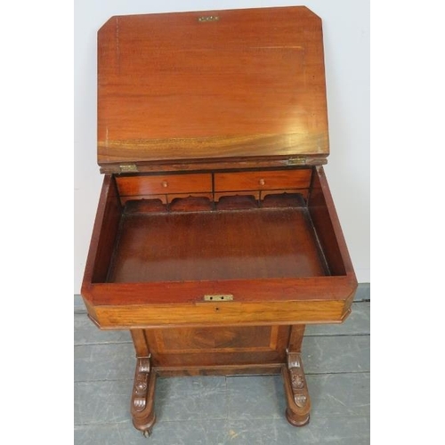 822 - A Victorian walnut Davenport with upper gallery and inset green leather writing surface, the lid ope... 