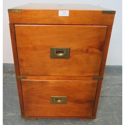 824 - A vintage yew wood brass mounted campaign chest/drinks cabinet, the dummy drawers with campaign hand... 