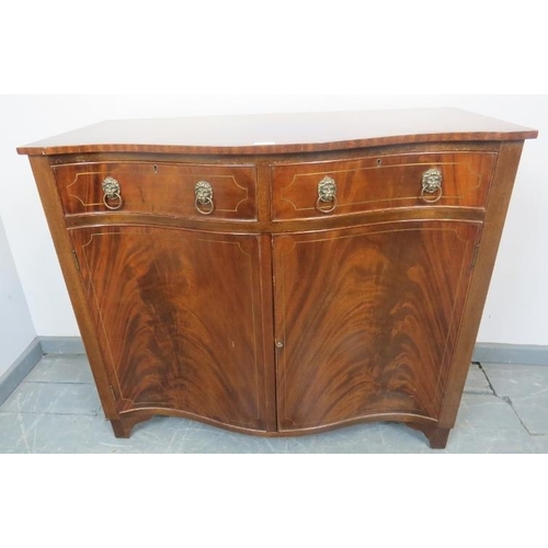 825 - An Edwardian Regency Revival serpentine flame mahogany sideboard, crossbanded and featuring brass in... 