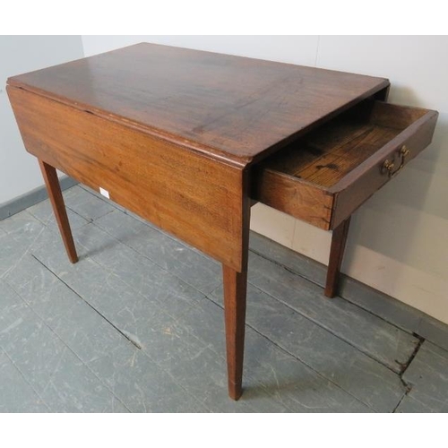 829 - A Georgian mahogany Pembroke table, the single drawer fitted with brass swan neck handle, on taperin... 