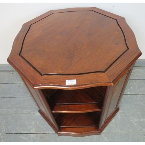 836 - A good quality hardwood freestanding octagonal bookcase, featuring burr wood fielded panels, with fo... 