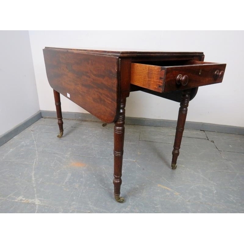 861 - An early Victorian mahogany Pembroke table of good colour, with single drawer and dummy drawer oppos... 