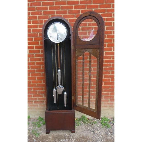 881 - An Art Deco oak cased 8-day chiming longcase clock, the brushed chrome dial with polished chrome Ara... 