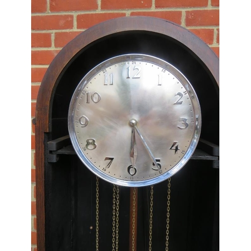 881 - An Art Deco oak cased 8-day chiming longcase clock, the brushed chrome dial with polished chrome Ara... 