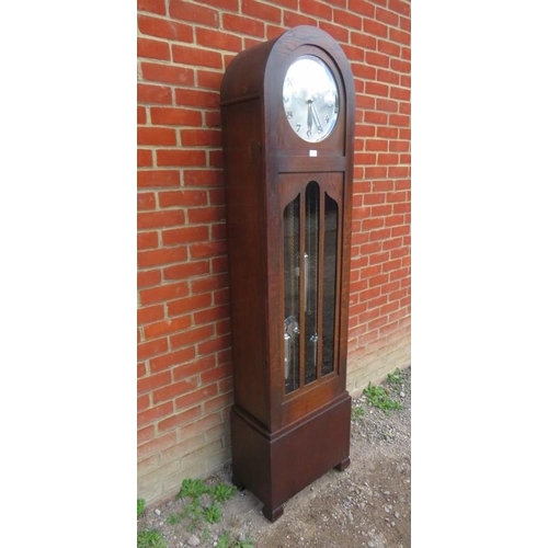 881 - An Art Deco oak cased 8-day chiming longcase clock, the brushed chrome dial with polished chrome Ara... 