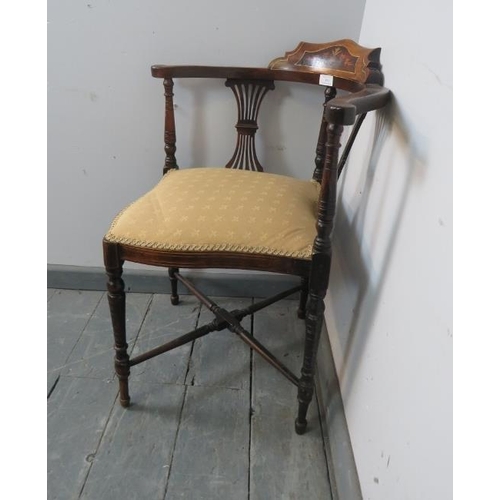 893 - An Edwardian mahogany corner chair, featuring marquetry inlay and pierced back splats, upholstered i... 