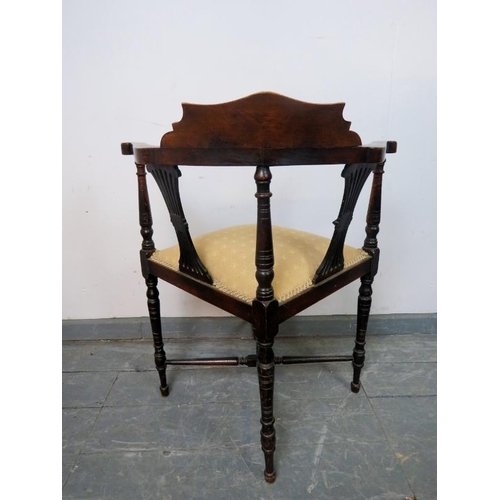 893 - An Edwardian mahogany corner chair, featuring marquetry inlay and pierced back splats, upholstered i... 