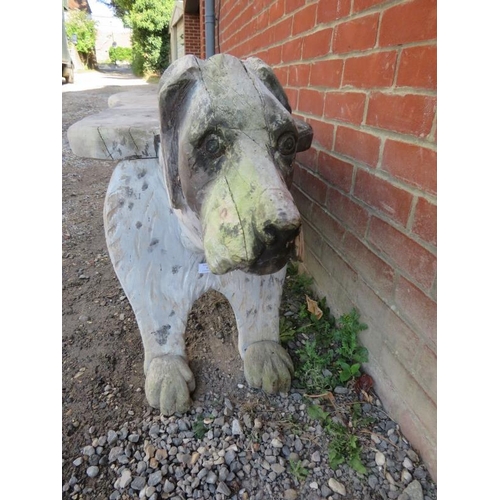 894 - A vintage folk art carved wooden garden seat, in the form of an English pointer, on paw feet. 
Condi... 