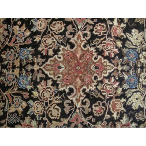 904 - A Persian Bidjar rug, decorated with a busy stylised foliate pattern on a blue ground within multi-b... 