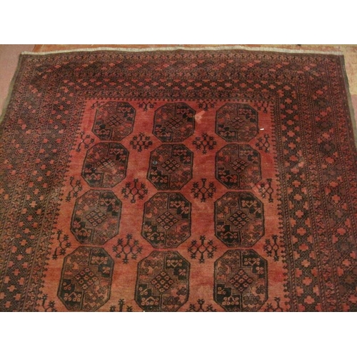 923 - A vintage Persian rug, probably early 20th century, decorated with a central field of 21 octagonal m... 