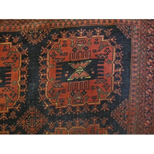 931 - A nice quality vintage Persian rug, decorated with a central field of 18stylised panels within multi... 