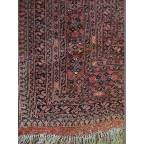 931 - A nice quality vintage Persian rug, decorated with a central field of 18stylised panels within multi... 