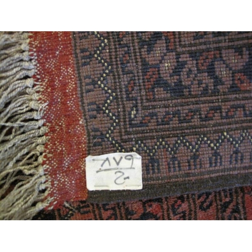 931 - A nice quality vintage Persian rug, decorated with a central field of 18stylised panels within multi... 