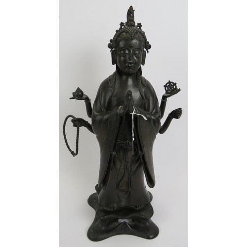 3 - An antique Chinese bronze figure of a Deity, probably the Buddhist Goddess Marici, with Chinese scri... 