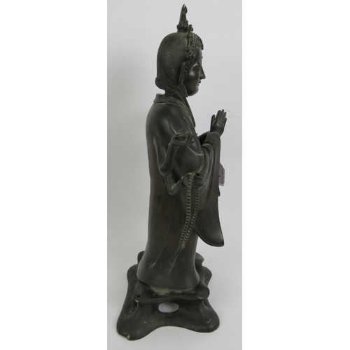 3 - An antique Chinese bronze figure of a Deity, probably the Buddhist Goddess Marici, with Chinese scri... 