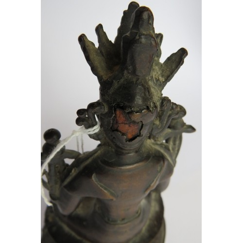 16 - A small antique Chinese bronze Deity figure, hollow cast. Height 17cm.
Condition report: Some histor... 