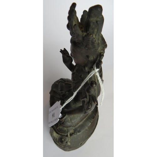 16 - A small antique Chinese bronze Deity figure, hollow cast. Height 17cm.
Condition report: Some histor... 