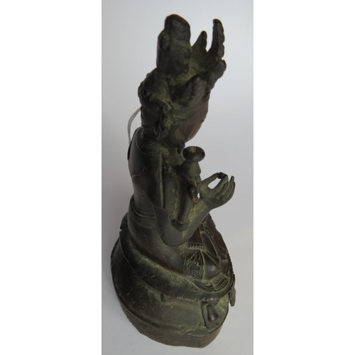 16 - A small antique Chinese bronze Deity figure, hollow cast. Height 17cm.
Condition report: Some histor... 