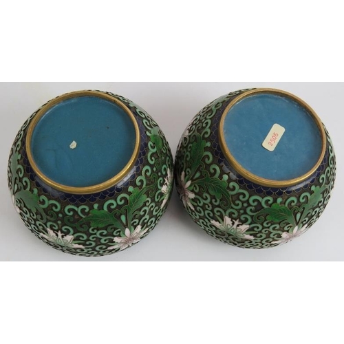 100 - A pair of high quality Chinese cloisonné enamel covered jars on stands of raised wire floral and fol... 