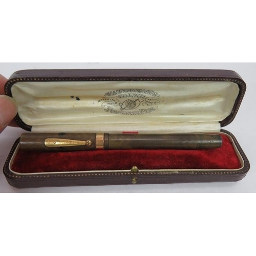 101 - A vintage Waterman's Ideal fountain pen with 9ct gold band and leather case, a sterling silver Water... 