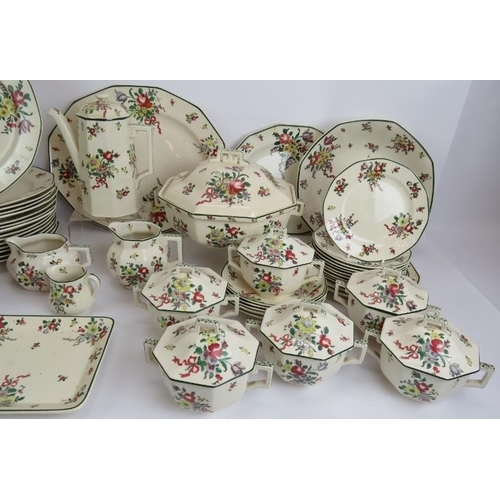 116 - A large Royal Doulton dinner service in 'Leeds Old Sprays' pattern including plates, coffee set, jug... 