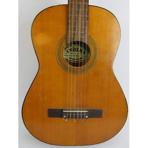 119 - A vintage Angelic model 2841 classical guitar by Boosey & Hawkes Ltd, 4/4.
Condition report: Some sc... 