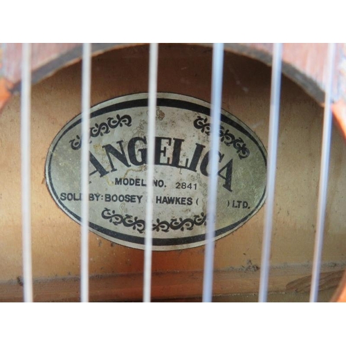 119 - A vintage Angelic model 2841 classical guitar by Boosey & Hawkes Ltd, 4/4.
Condition report: Some sc... 