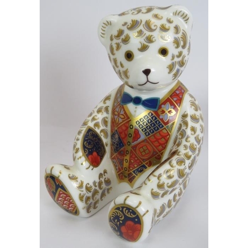 124 - A lot of mixed collectables including a Crown Derby teddy bear, perfume bottles, cloisonné, a Herman... 