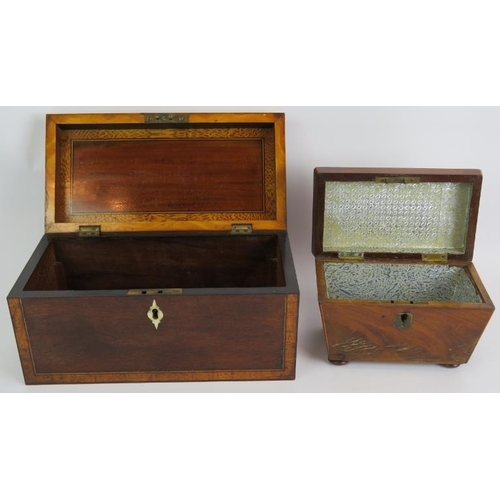 125 - A finely inlaid 19th century caddy box, a smaller sarcophagus shaped tea caddy and a light oak stati... 